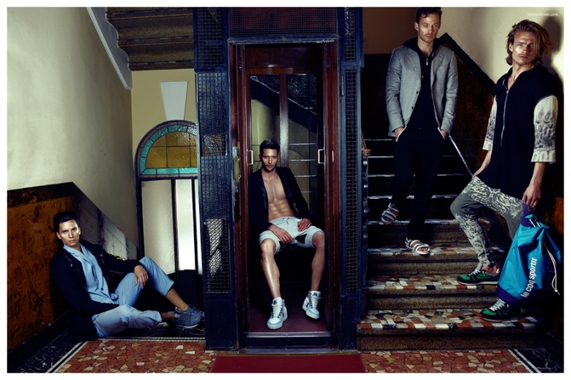 Left to Right: Nikola wears sweatshirt Department 5, suit Corneliani and sneakers Asics. Elia wears all clothes Urban Les Hommes. Maximilian wears jacket Bally, sweatshirt Hamaki-Ho, sweatpants Dirk Bikkembergs and shoes Ash. Stefan wears all clothes Gall, bag Le Coq Sportif and sneakers Lotto Leggenda.