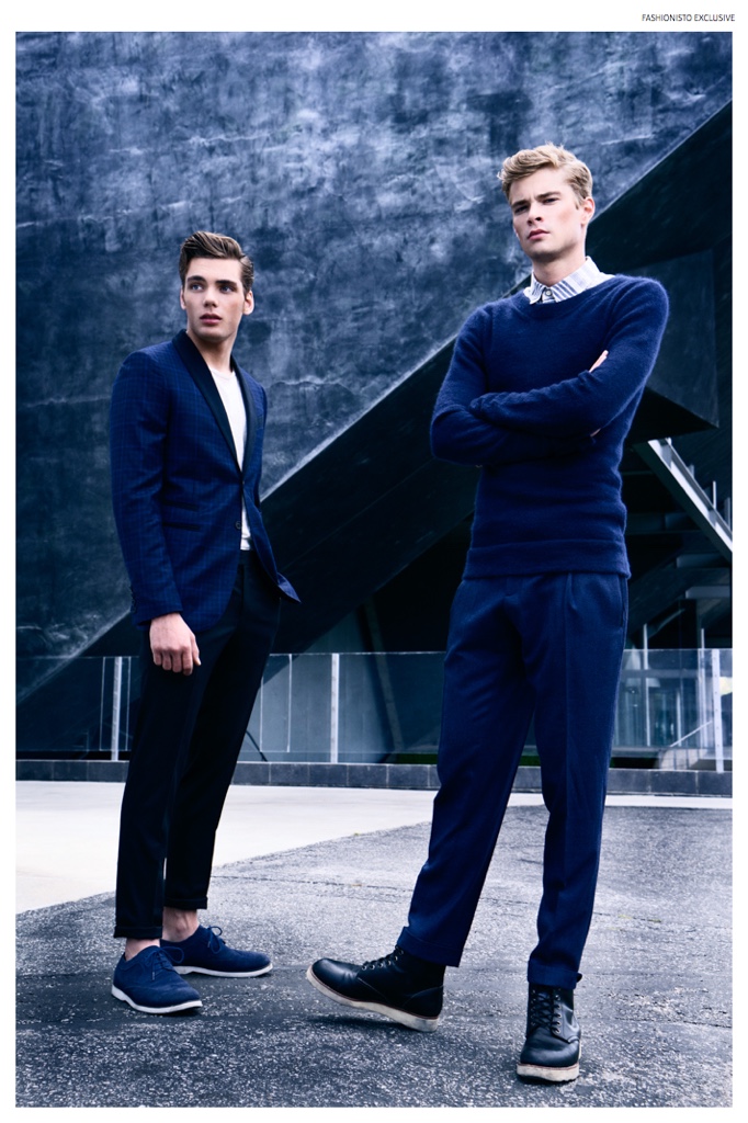 Left to Right: Sam wears t-shirt Nudie Jeans, shoes Carlo Pazolini, plaid blazer and trousers Flos Floris. Frederik wears striped button-down Jacob Davis, sweater Jenny Schwarz, trousers Gucci and shoes model's own.