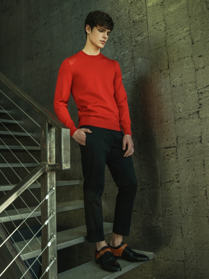 Casey wears trousers Jil Sander, sweater and shoes Alexander McQueen.