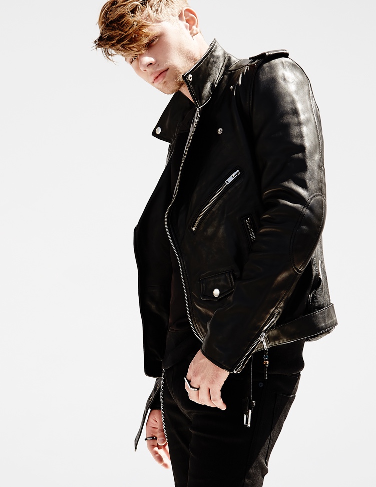 Cody wears quilt sweatshirt Helmut Lang, black jeans Diesel and leather jacket BLK DNM.