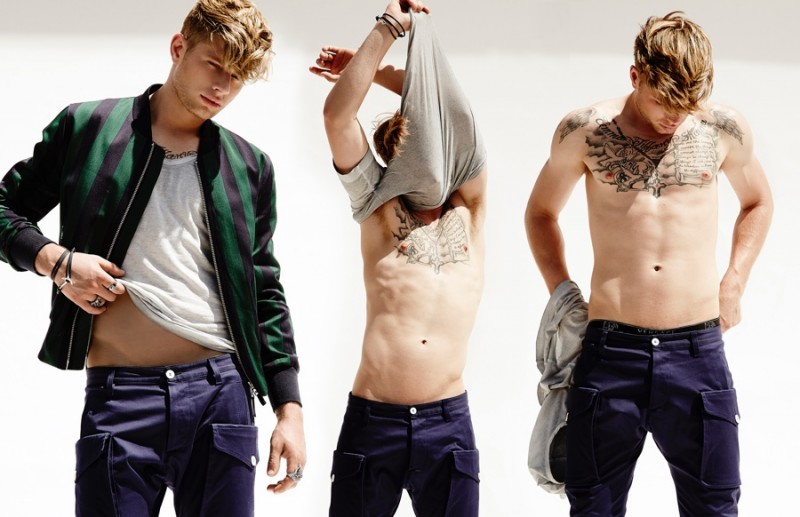 Cody wears t-shirt Diesel, cargo pants Dsquared2 and striped zip jacket AMI.