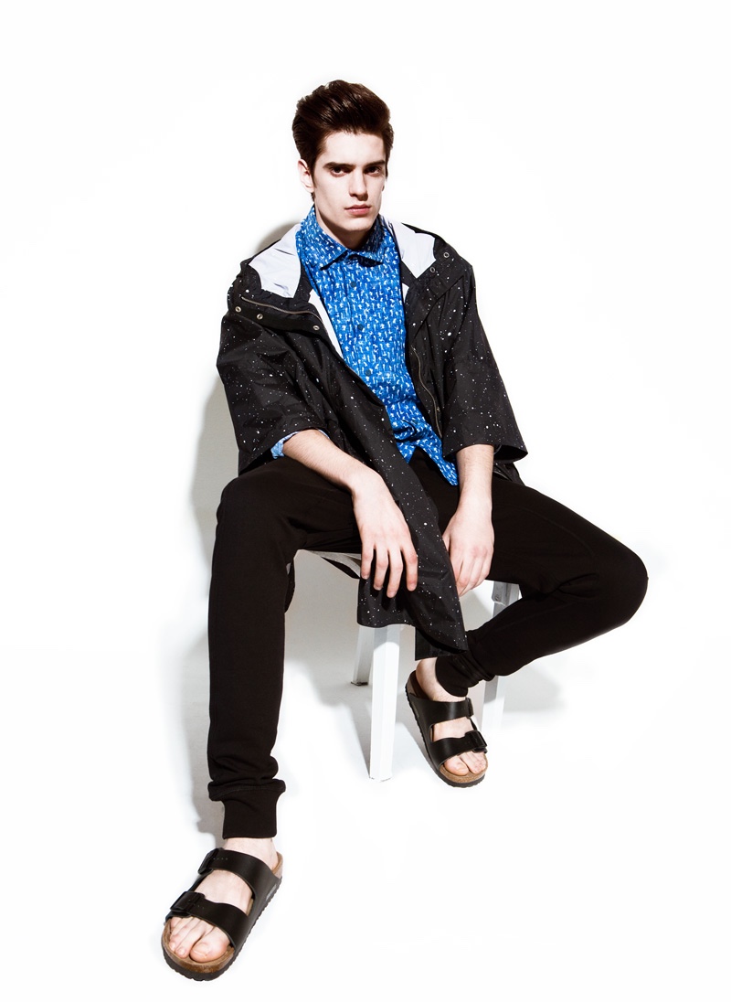 Daniel wears raincoat Supremebeing, shirt Desigual, trousers Redskins and sandals Birkenstock.