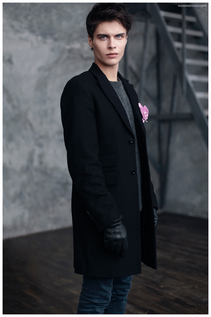 Egor wears coat Dior Homme, sweater Michael Kors, trousers Topman, leather gloves and flower pin model's own.