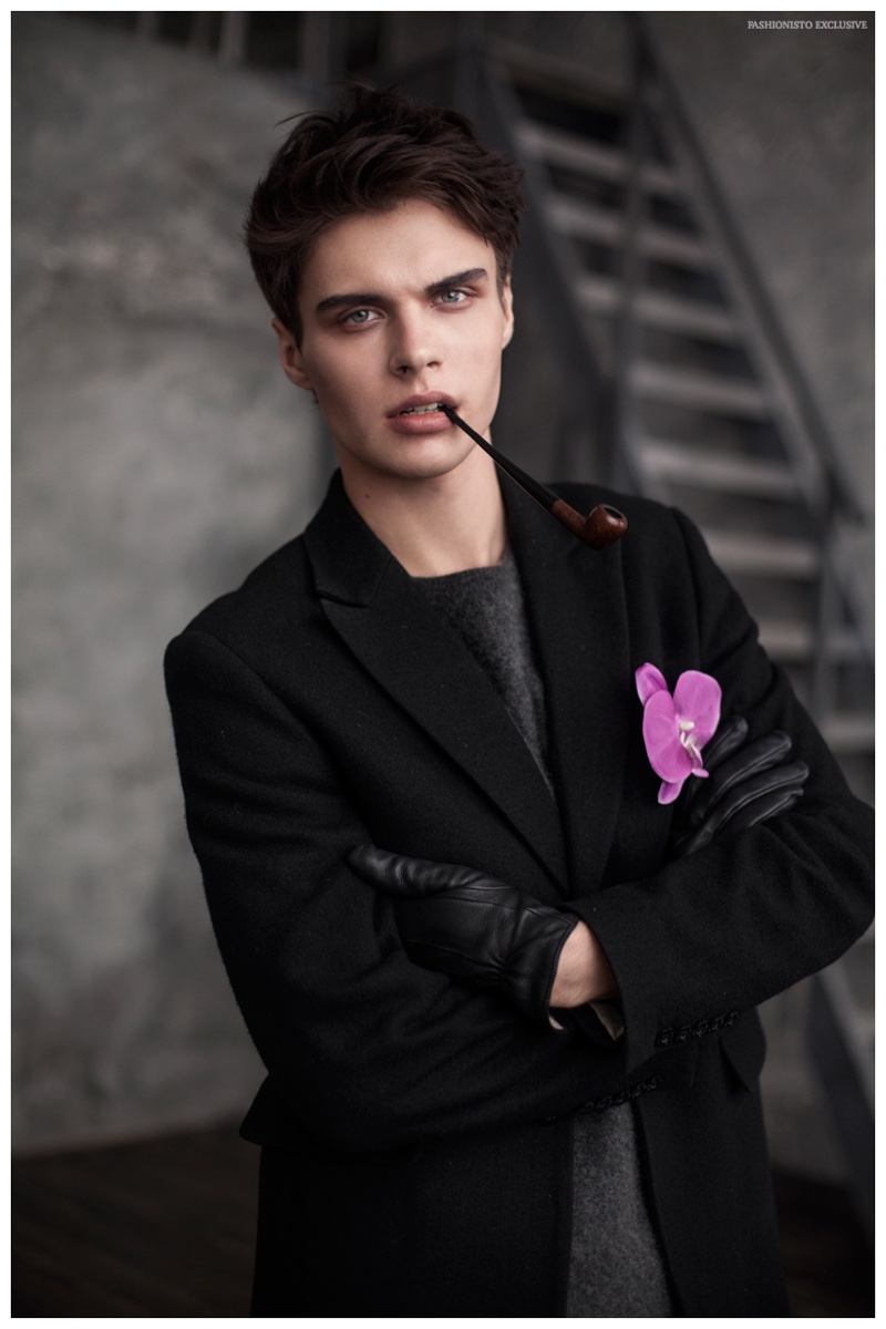 Egor wears coat Dior Homme, sweater Michael Kors, leather gloves and flower pin model's own.