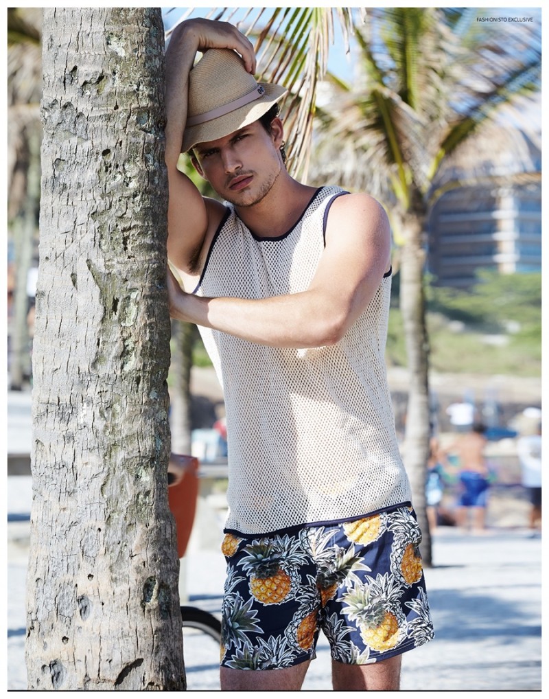 Thiago wears hat Kaminsky XY, shirt Woolrich John Rich & Bros. and shorts Vilebrequin.