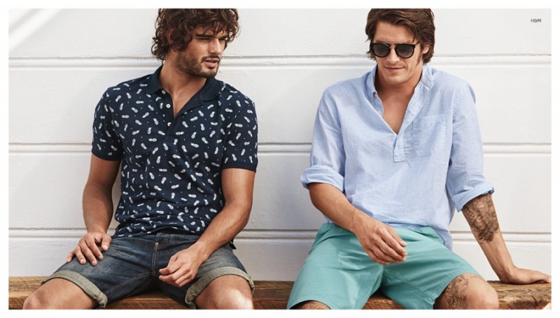 Marlon (right) sports a printed polo shirt in navy.