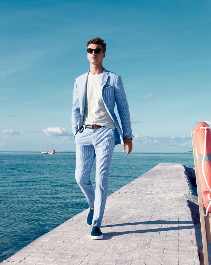 Clément  suits up in pale blue.