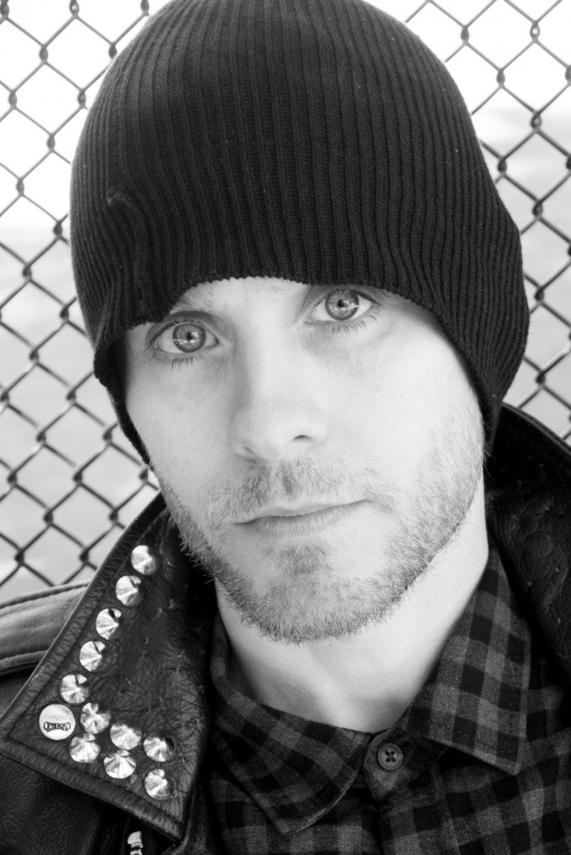 Jared Leto hides his green hair under a beanie.