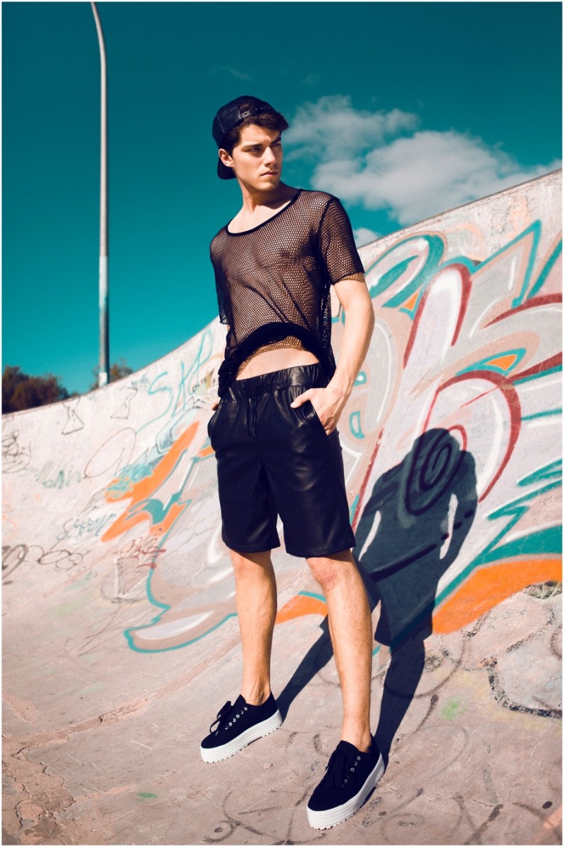 Juan is sporty in a black mesh number.