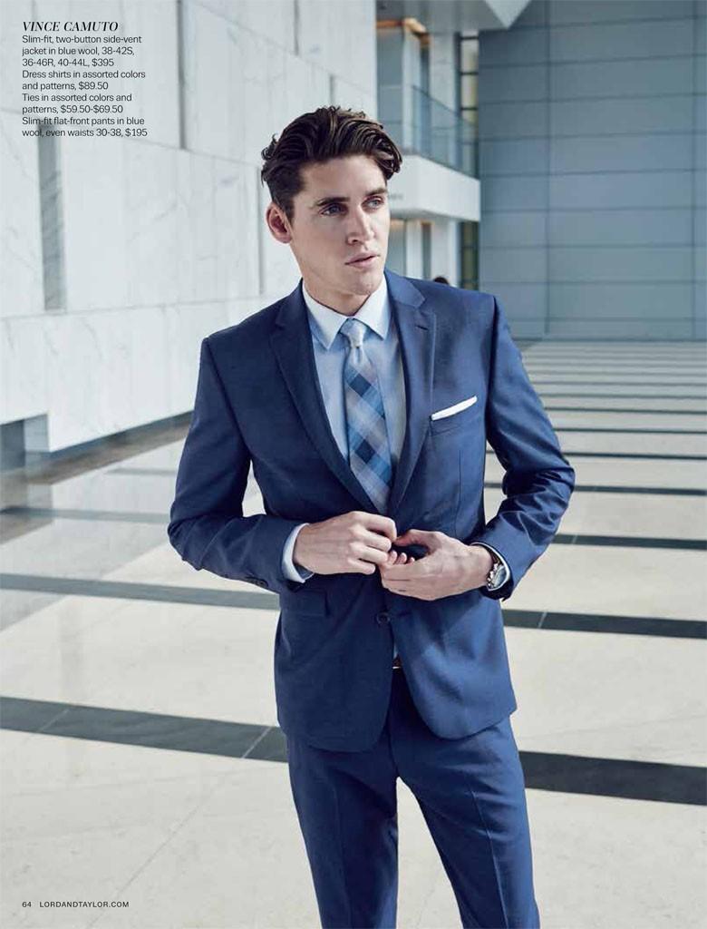 Isaac wears suit Vince Camuto.