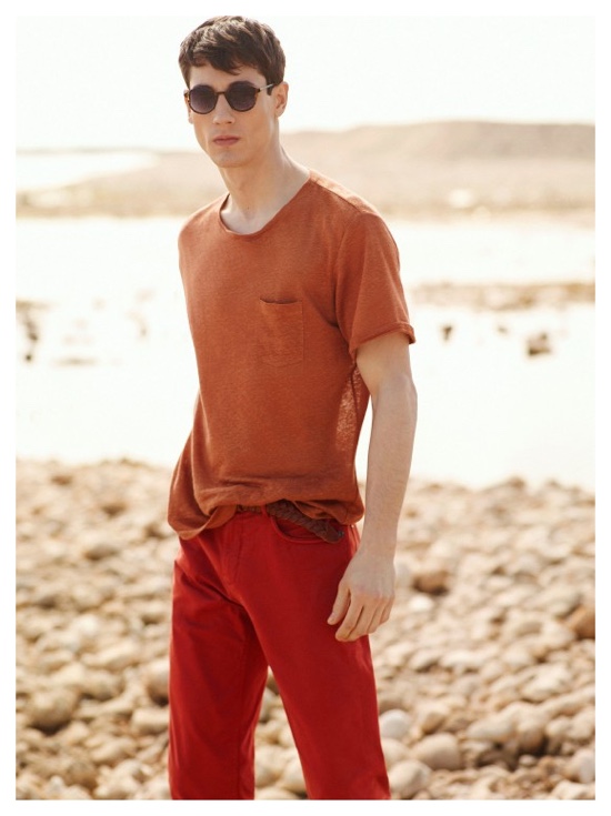 Nicolas is ready for summer in a colorful look that incorporates red and burnt orange.