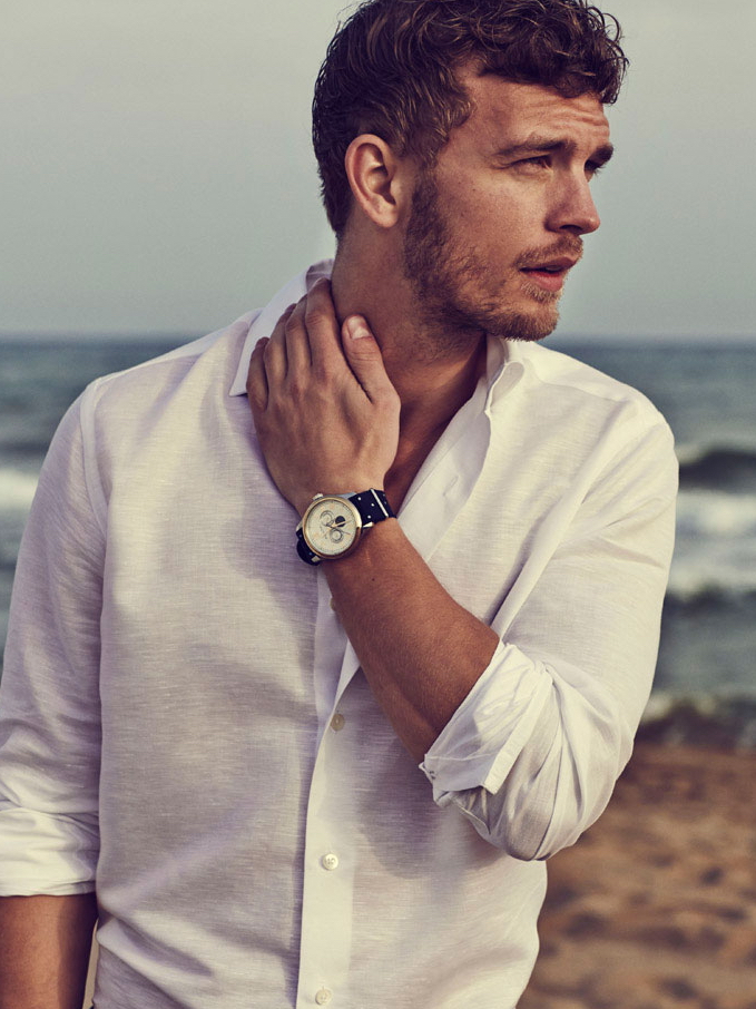 Benjamin Eidem hits the beach in a classic white shirt.