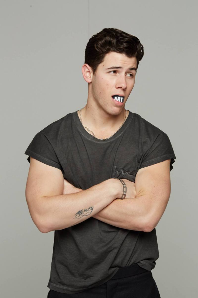 Nick Jonas poses for a cheeky editorial image.