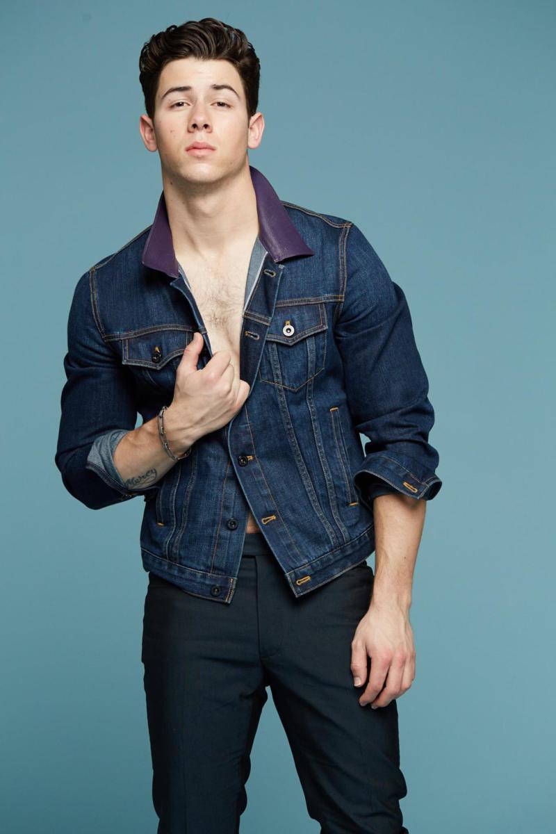 Nick Jonas sports a current denim jacket from British brand Burberry.