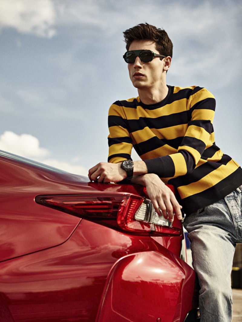 Nicolas channels racing stripes in a knit from Dior Homme.