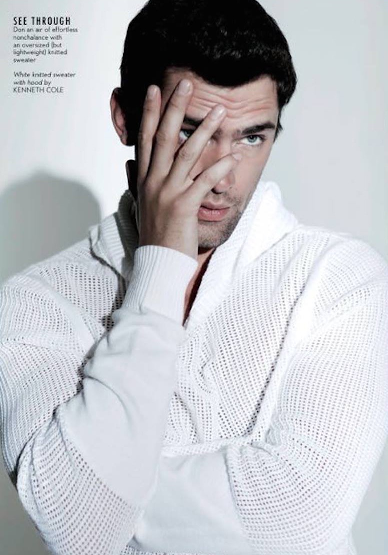 Sean O'Pry plays coy in a cozy white knit.