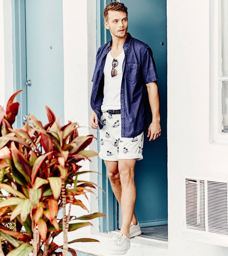 Benjamin embraces leisure style in printed shorts with a relaxed button-down.