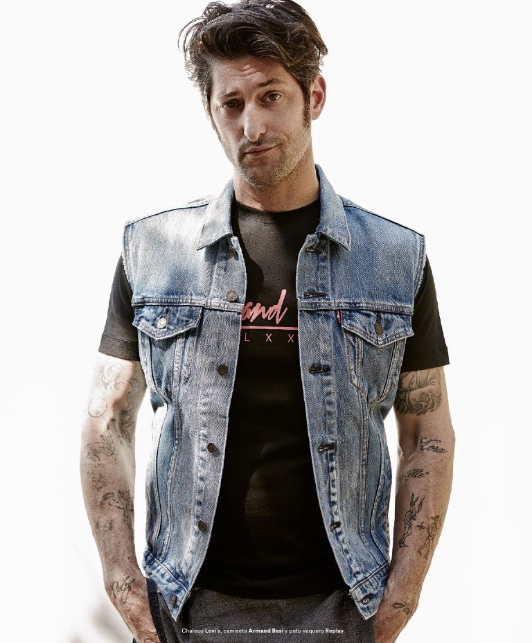 Tony Ward wears one of Levi's iconic denim trucker vests.