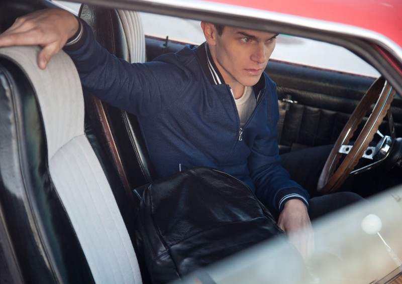 Vincent LaCrocq poses in his Mustang.