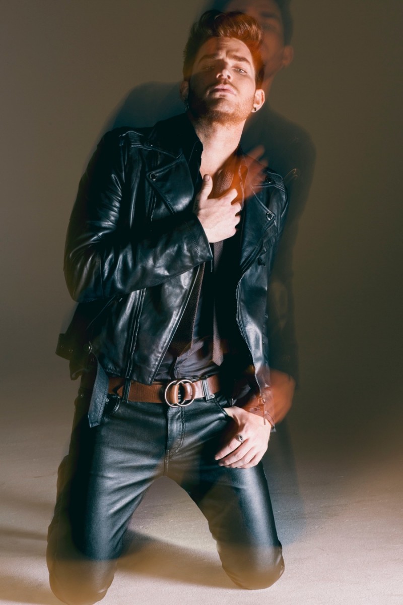 Adam Lambert mixes black and brown leather.