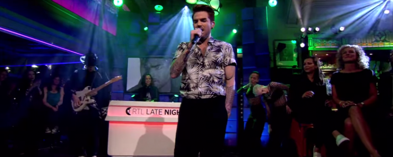 Adam Lambert performs Ghost Town in a MSGM tropical print short-sleeve shirt.