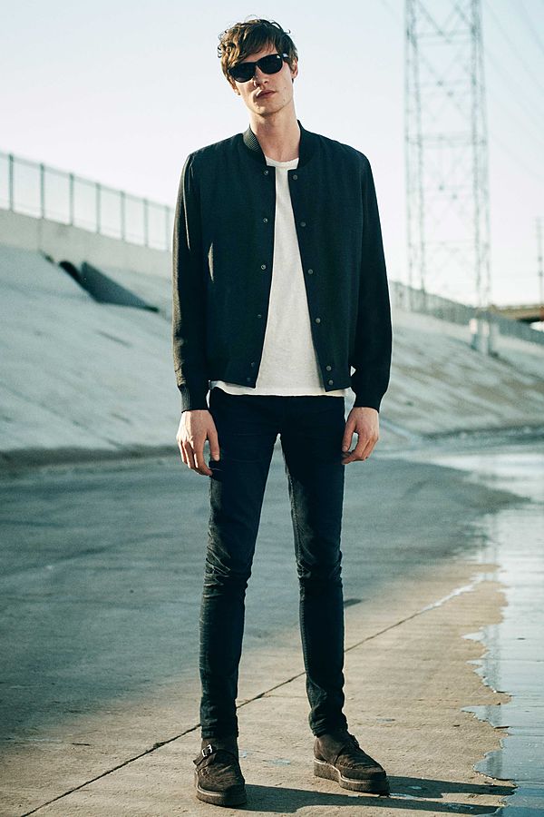 Matthew sports a summer-weight bomber jacket.