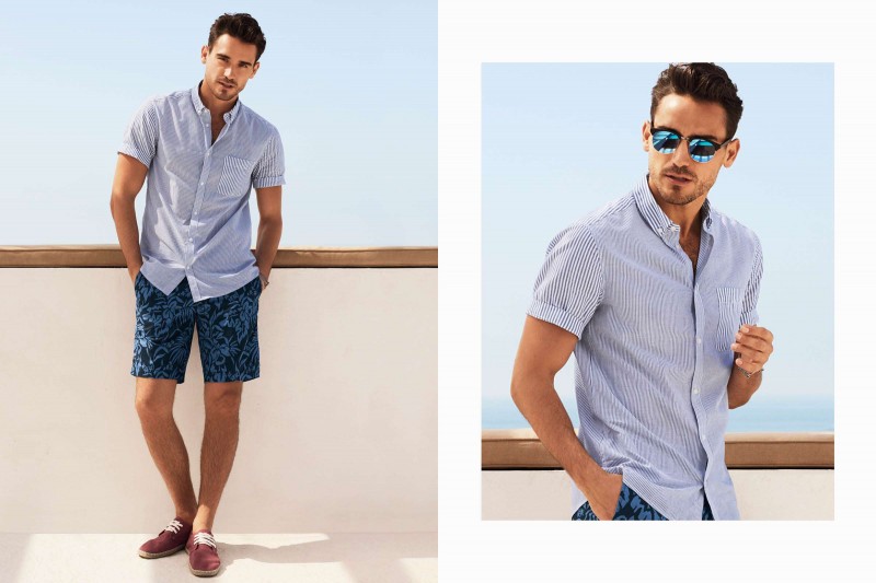 Arthur Kulkov plays it easy in a smart shirt paired with printed shorts.