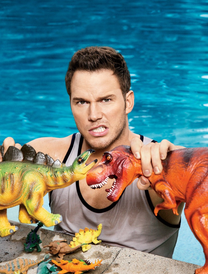 In the pool, Chris Pratt gets up to mischief, playing with toy dinosaurs.