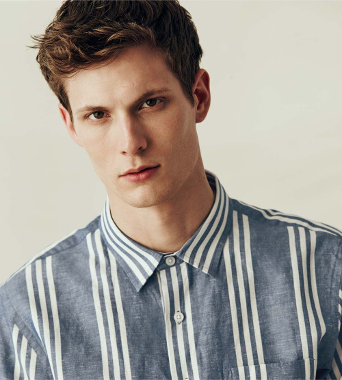 Felix wears Club Monaco striped shirt.