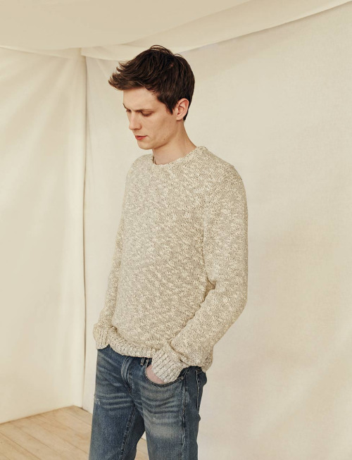 Felix wears Club Monaco marled slub crewneck sweater and straight-fit jeans.