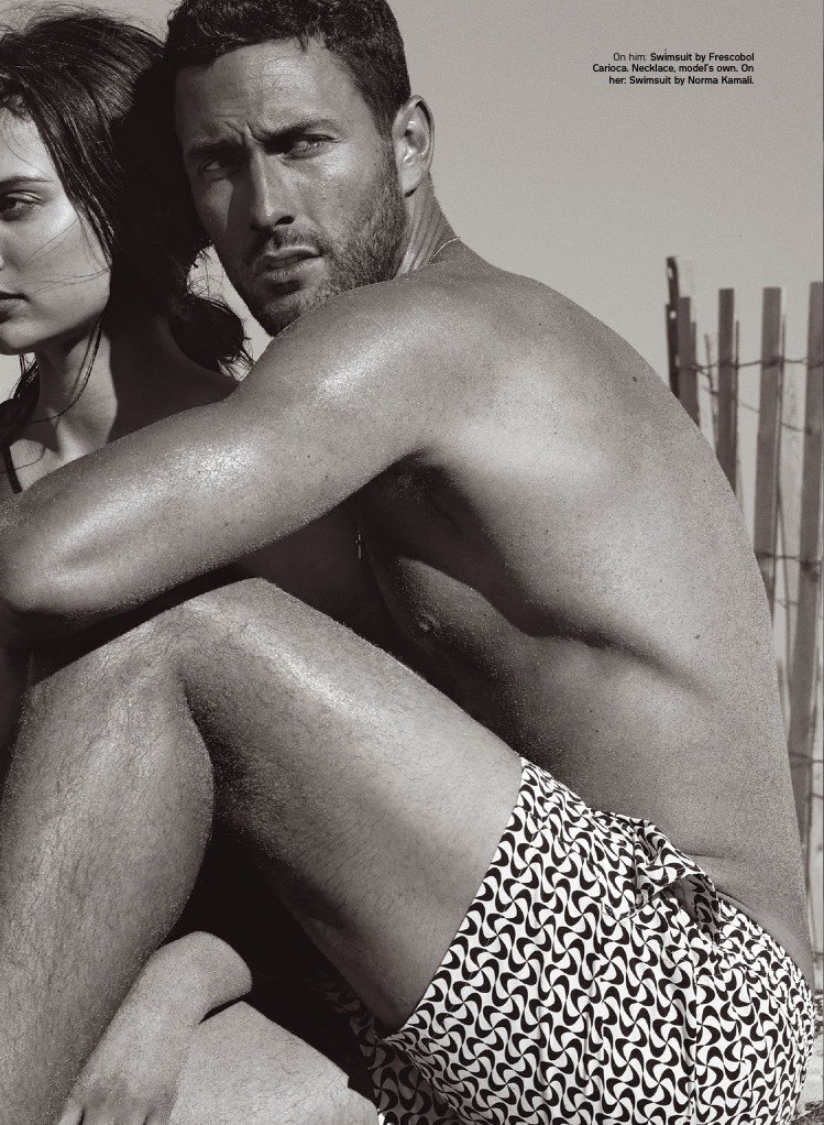 Noah Mills wears swimsuit Frescobol Carioca.