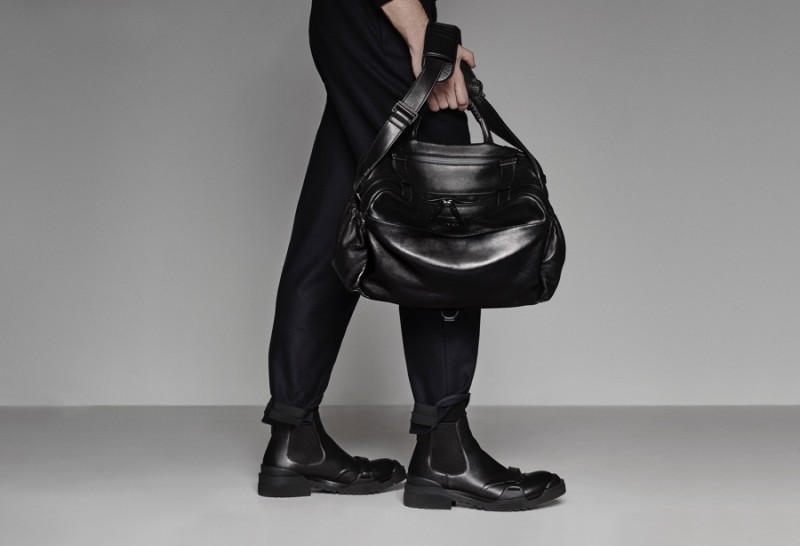 Ermenegildo Zegna Couture goes luxe with black leather shoes and accessories.