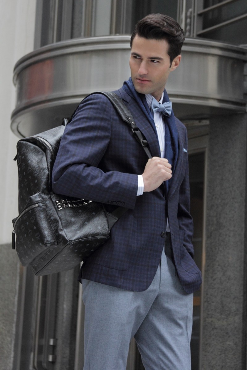 Alessandro wears dress shirt Eton, bow-tie Hugo Boss, pocket square Fine and Dandy, backpack MCM, jacket and trousers Samuelsohn.