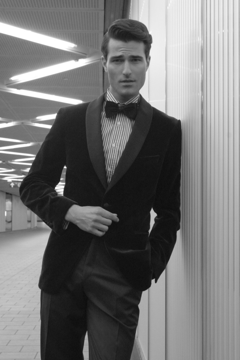 Alessandro wears dinner jacket Samuelsohn, tuxedo trousers Hickey Freeman, tuxedo shirt Indochino and bow-tie Armani.