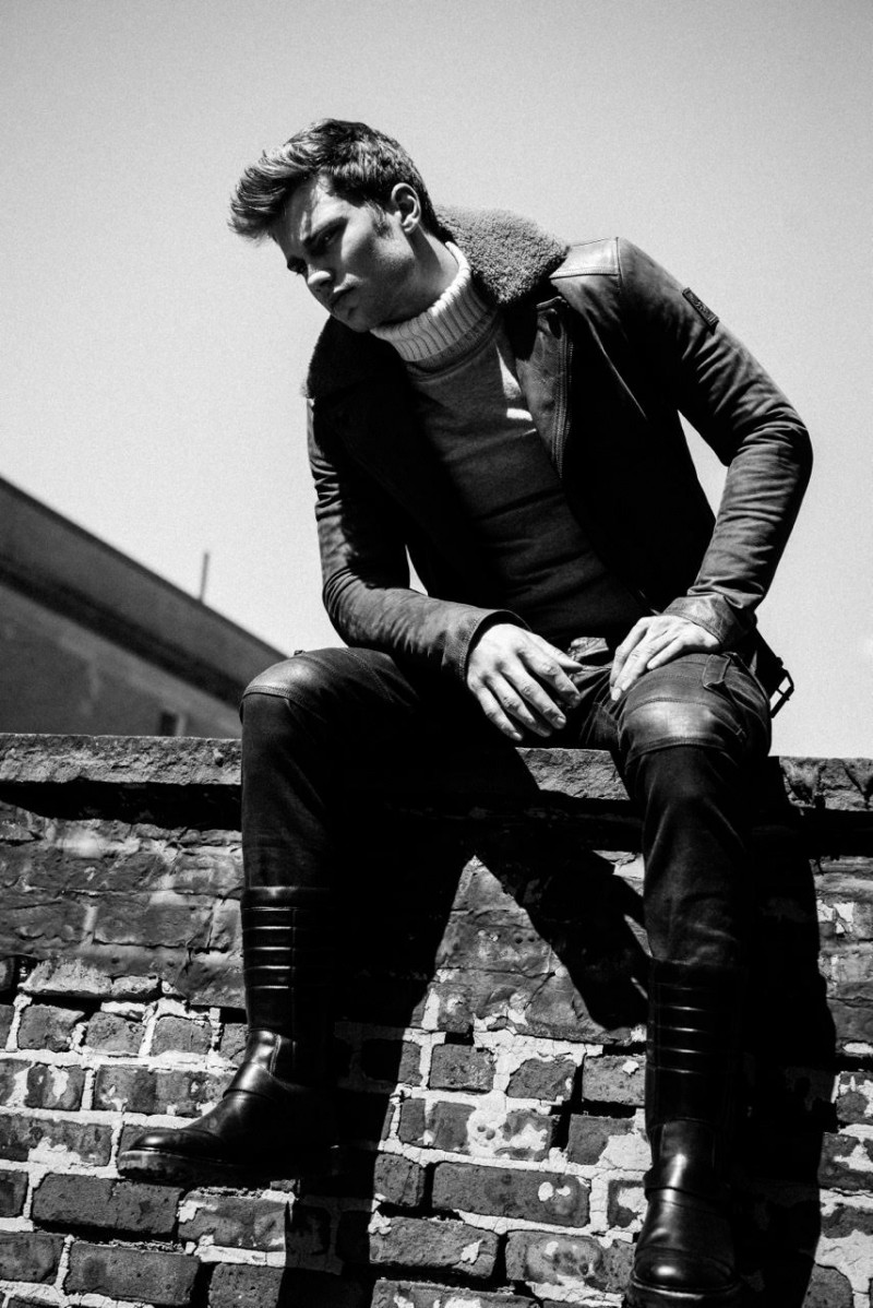 Wearing leather pants and a shearling collared jacket, Bobby is styled by Maleeka Moss.