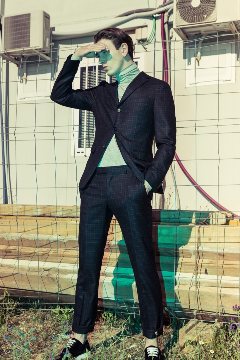 David wears suit Z Zegna, turtleneck COS and shoes Dsquared2.