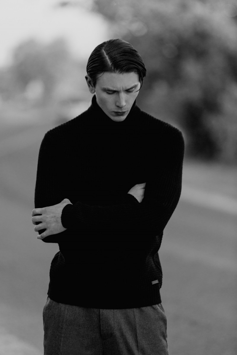 David wears turtleneck Calvin Klein and pants Just Cavalli.