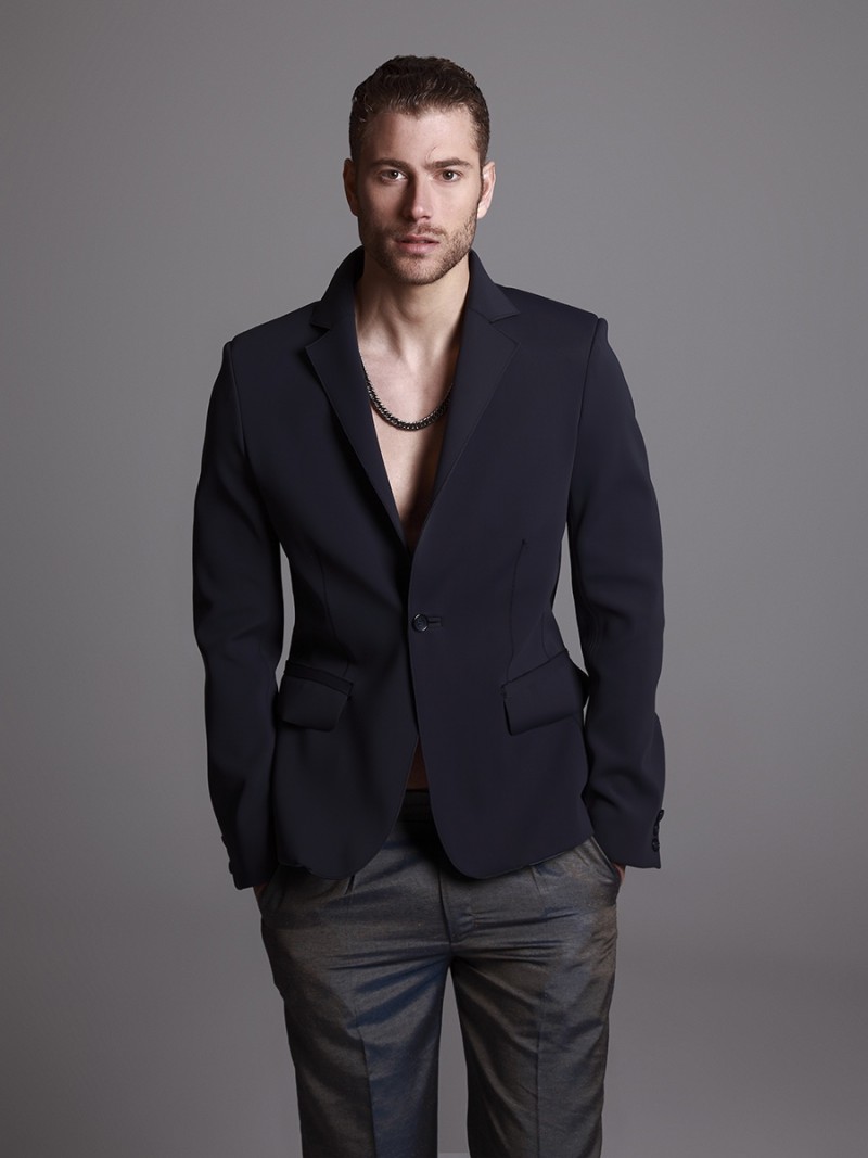 Jacob wears blazer Ana Locking, trousers Soloio and necklace H&M.