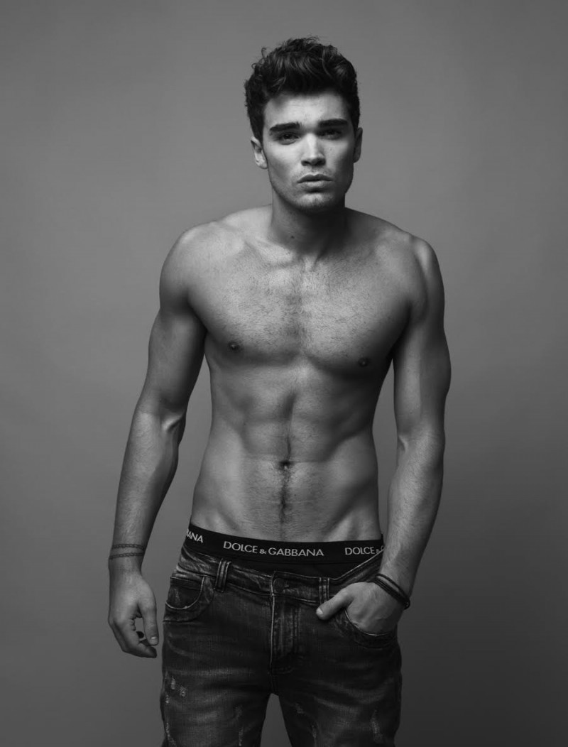 Josh wears jeans Underated and underwear Dolce & Gabbana.