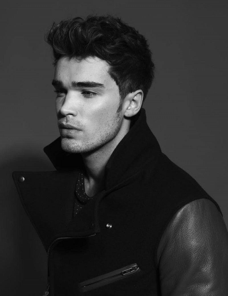 Josh wears varsity jacket The Brooklyn Circus.