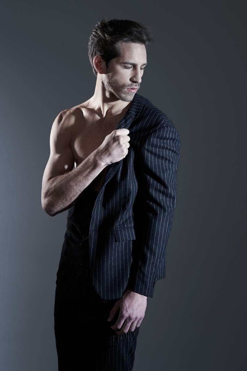 Jonathan wears suit Mauro Grifoni and vintage skirt used as a bustier Archivi Mazzini.