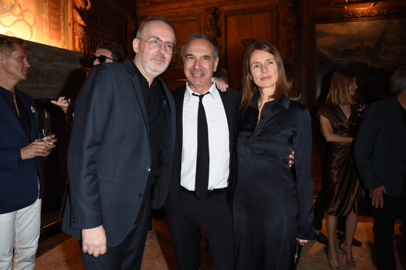 MILAN, ITALY - JUNE 20: Jim Moore, Carlo Capasa and Karla Otto attend GQ Party for Jim Moore during Milan Menswear Fashion Week Spring/Summer 2016 at Casa Degli Atellani on June 20, 2015 in Milan, Italy.  (Photo by Jacopo Raule/Getty Images for GQ)