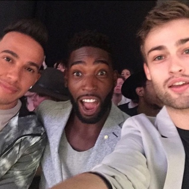 Lewis Hamilton, Tinie Tempah and Douglas Booth take a selfie front row at Topman Design's spring-summer 2016 show.