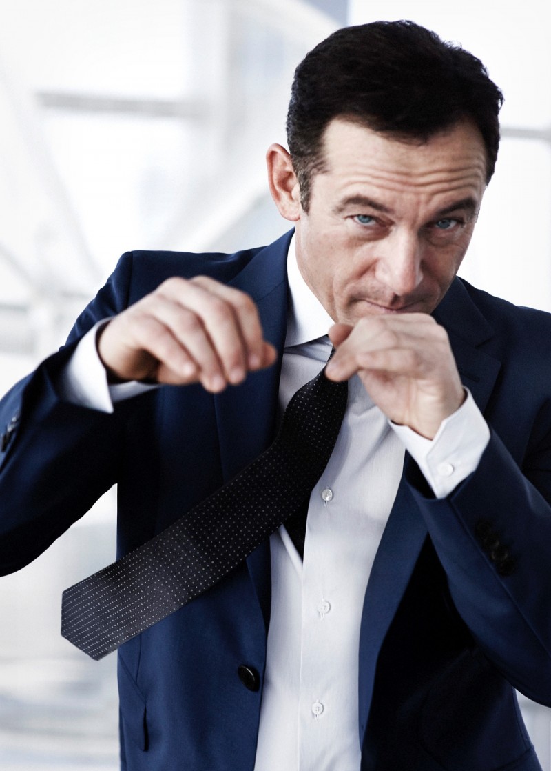 Jason Isaacs throws a punch in a photo shoot for the spring-summer 2015 issue of Esquire Black Book.