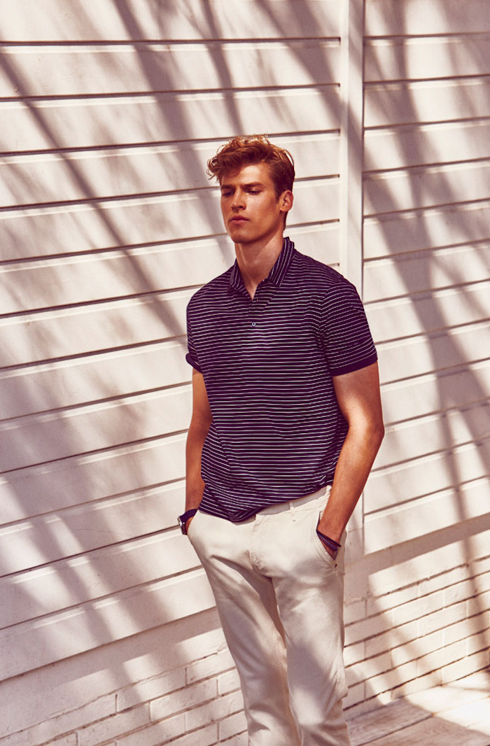 Joel rocks a smart polo shirt with chinos.