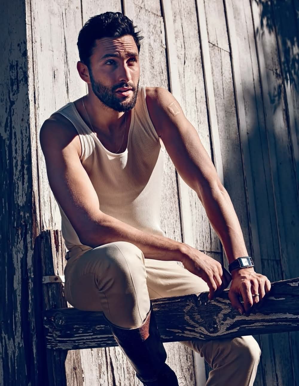 American model Noah Mills wears a pair of leather riding boots with a casual ensemble for The Sunday Telegraph.