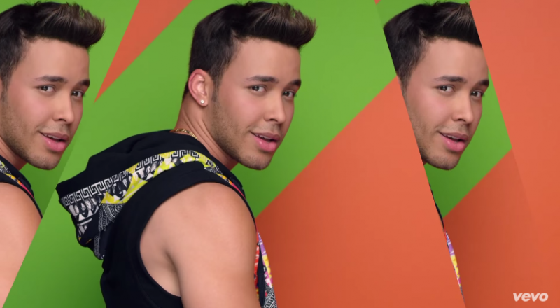 Prince Royce wears Versus Versace sleeveless print hoodie.