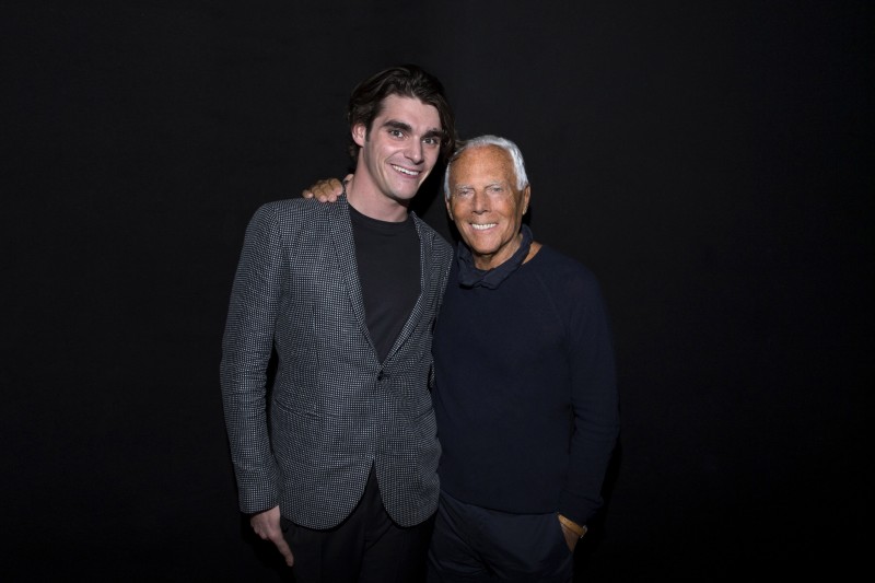 RJ Mitte poses for a photo with designer Giorgio Armani.