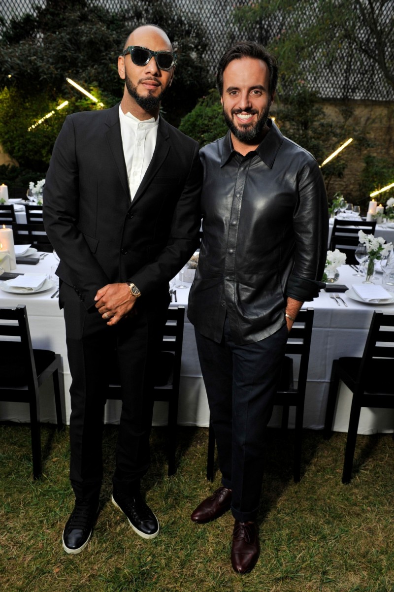 Swizz Beatz poses for a photo with Farfetch founder and chief executive Jose Neves.