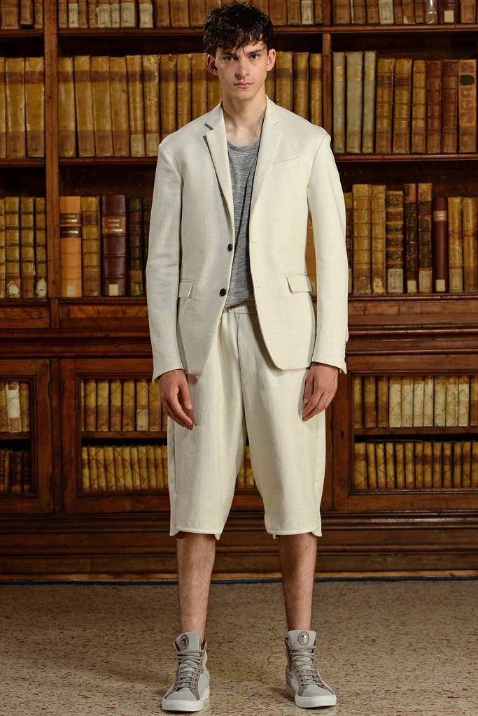 Trussardi brings a certain sportiness to the suit for spring. The traditional wardrobe staple is made current and modern with slouchy shorts and the addition of a casual tee.